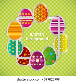 Spring greeting background with Easter eggs. Festive paper images of eggs on a square light frame. Country style green tablecloth. Vector greetings card with the Happy Easter!
