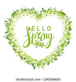 Spring heart shaped frame with green herbs