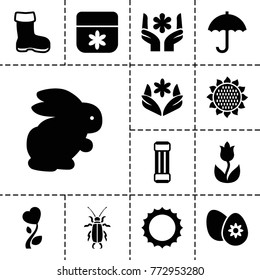 Spring icons. set of 13 editable filled spring icons such as rabbit, sunflower, boot, flower, expander sport, heart flower, easter egg, sun, umbrella