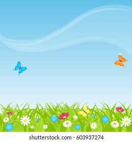 Spring. An image of grass. From the grass flowers are seen. Three butterflies fly
