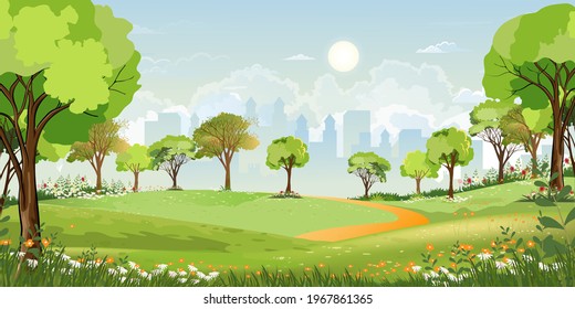 Spring landscape at city park in the morning, Natural public park with flowers blooming in the garden, Peaceful scene of green fields with blurry cityscape building, cloudy and sun on summer