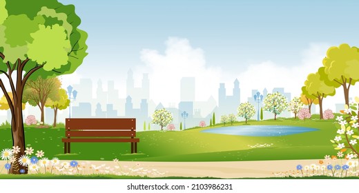 Spring landscape at city park in the morning, Natural public park with flowers blooming in the garden, Peaceful scene of green fields with blurry cityscape building, cloudy and sun on summer
