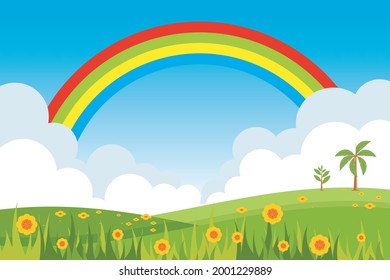 Spring landscape countryside with green meadow hills and rainbow