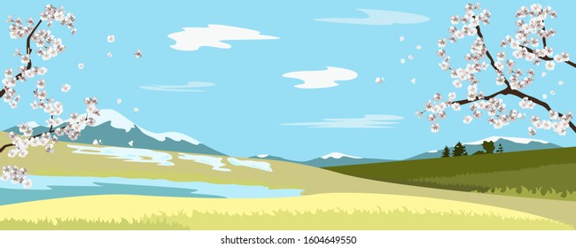 Spring landscape with lake and Apple tree. Green meadow in spring