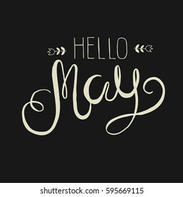 Spring lettering - Hello May. Vector handwritten typography. Easter  lettering for invitation, greeting card, prints and posters. Typographic design.
