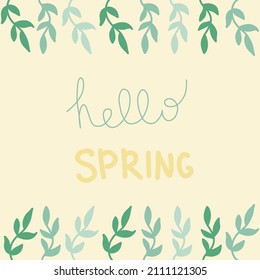 Spring lettering on the yellow background with green branches