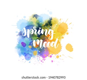 Spring mood - handwritten modern calligraphy inspirational text on multicolored watercolor paint splash. 