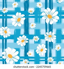 Spring pattern of chamomile flowers of different sizes on a blue checkered background. Vector seamless pattern.