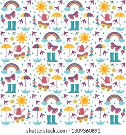 Spring pattern with rainbow, sun, umbrella, paper boat and rain icons. Springtime seamless background for wrapping paper or print.