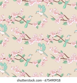 Spring sakura or apple flowers seamless pattern with birds.