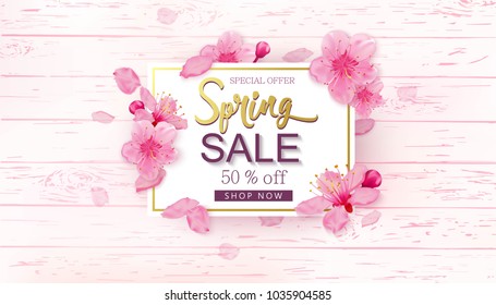 Spring Sale background with flowers. Season discount banner design with cherry blossoms and petals. Vector wooden backdrop.