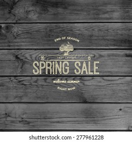 Spring sale badges logos and labels for any usem, on wooden background texture