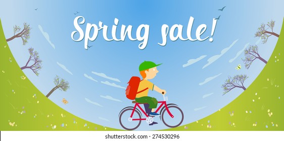 Spring sale banner with boy on bike