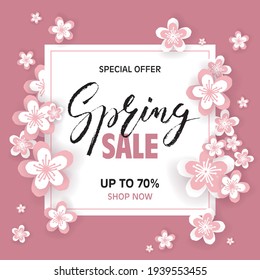 Spring Sale brush lettering on pink background with sakura flowers in paper-cut style. Template for sale card, banner, wallpaper, voucher, poster, flyer. Vector illustration. EPS10