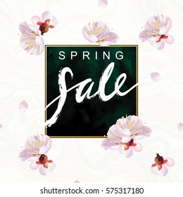 "Spring Sale" hand written lettering. Blossom mood illustration. Flayer vector template. Textured plum tree flowers and petals on marble background. Shabby gold and green "emerald" velvet texture.