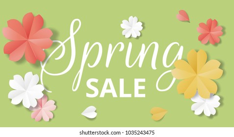 Spring sale horizontal web banner. Paper flowers on green background in origami stale