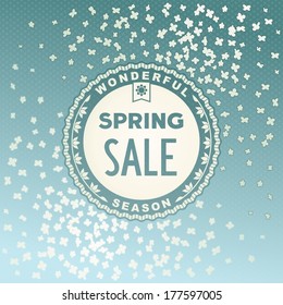 Spring SALE label design on beautiful flowers background. Vector graphics CMYK eps10