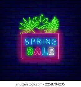 Spring sale neon signboard. Season special offer with tropical leaves. Shopping badge. Shiny advertising on brick wall. Glowing banner with typography. Vector stock illustration