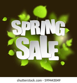 Spring sale placard template for card, placard, flyer, banner, brochure. Green blurred leafs on dark background. 