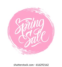 Spring Sale sign with calligraphic text design and pink circle brush stroke background for business, promotion and advertising. Vector illustration.