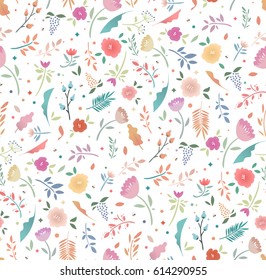 Spring seamless floral pattern on a white background. Bright flowers and leaves, flat design. Background for fabric, paper, children's clothing.
