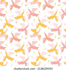 Spring seamless pattern with flying birds on a white background. Pink and yellow birds with flowers and olive branches in their beaks. Design in pastel colors for textiles, print, wallpaper