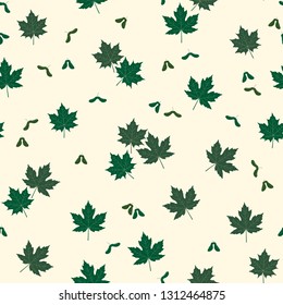 The spring seamless pattern with green maple leaves on a yellow background. Vector.
