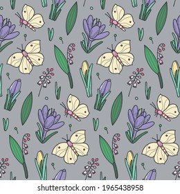 Patrón sin costuras de primavera con lirios, crocos, hojas, mariposas sobre un fondo gris. Violeta, amarilla, verde y menta. Adecuado para tarjetas, papel pintado, papel, tela, decoración interior y otros