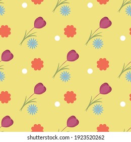 Spring seamless pattern of tulip, chamomile and red on a yellow background