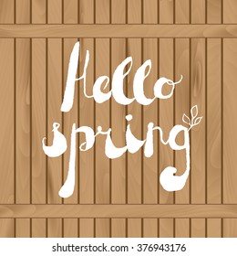 Spring season welcoming, season greetings. Handwritten text "Hello spring" on wooden fence. Modern vector card template. Layered for easy editing.