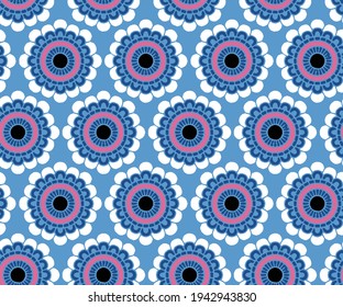 Spring and summer geometric seamless ornamental. hexagon flower shape circle pattern, blue, white,pink, on a blue  background.