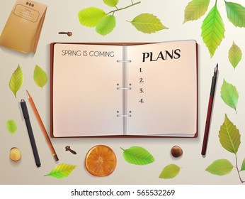 Spring template with sketchpad and pencil. Blank template with green leaves and orange. Stationery mock-up with a pen on a light background.