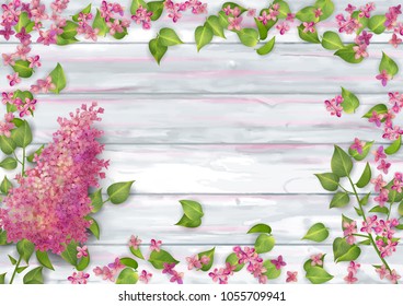 Spring top view wooden background with blooming branch of lilac on wooden background