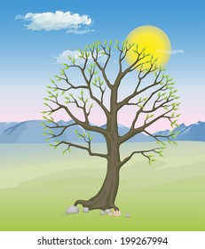 A spring tree with green lush foliage against the background of mountains and sky