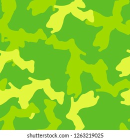 Spring UFO camouflage of various shades of yellow and green colors. It is a colorful seamless pattern that can be used as a camo print for clothing and background and backdrop or computer wallpaper