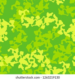 Spring UFO camouflage of various shades of yellow and green colors. It is a colorful seamless pattern that can be used as a camo print for clothing and background and backdrop or computer wallpaper