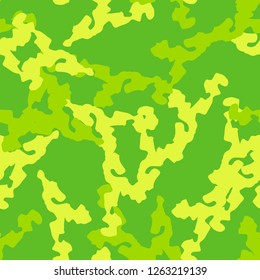Spring UFO camouflage of various shades of yellow and green colors. It is a colorful seamless pattern that can be used as a camo print for clothing and background and backdrop or computer wallpaper