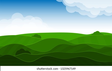 Spring vivid landscape with hills, grass and sky. Clouds and shadows. Seasons of the year spring or summer