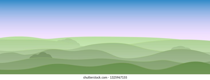 Spring vivid landscape with hills, grass and sky. Clouds, fog and shadows. Seasons of the year spring or summer
