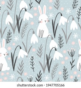 Spring wild flowers vector seamless pattern. Snowdrop vector print. Easter pattern with cute bunny