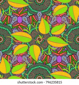 Spring wrapping paper. Nature background. Leaves on a green, brown and pink colors. Hand drawn leaves seamless pattern. Vector illustration.