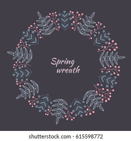 Spring wreath consisting of branches with leaves and berries. Line drawing