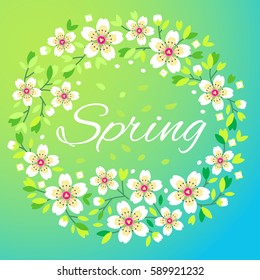 Spring wreath of white flowers. Sakura flowers in the shape of a wreath on a light blue background. Beautiful greeting card