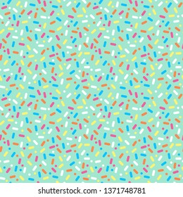 Sprinkles Seamless Pattern - Colorful sprinkles on solid background repeating pattern design