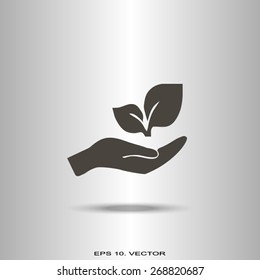sprout in a hand of environmental protection