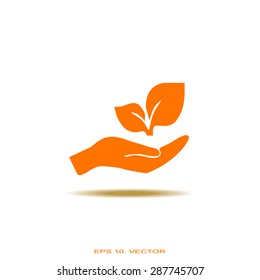 sprout in a hand of environmental protection