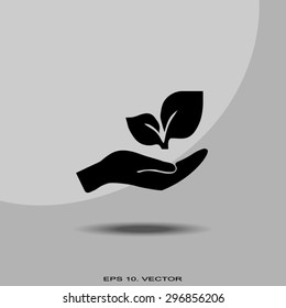 sprout in a hand of environmental protection