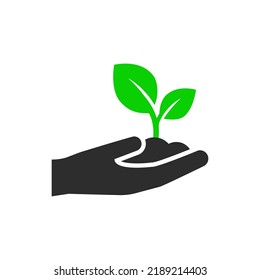 Sprout in hand icon. Vector illustration