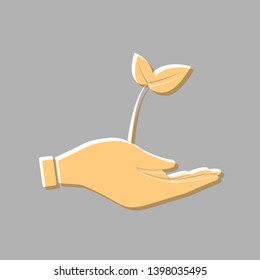 Sprout in a hand sign of environmental protection. Emboss effect with light orange icon on gray background.