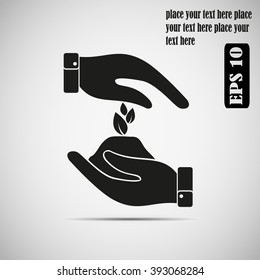 Sprout in a hand sign of environmental protection